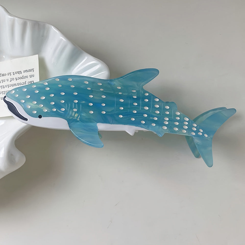 Clear blue Alorar shark hair claw clamp with a textured finish, perfect for securing hairstyles.