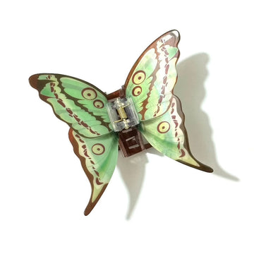 Green Dragontail Butterfly Hair Claw by Alorar with intricate butterfly design and vibrant green color, ideal for styling.