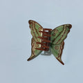 Green Dragontail butterfly hair claw clamp by Alorar, featuring intricate wing designs and a vibrant green color.