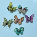 Alorar green dragontail butterfly hair claw clamp with intricate wing design and durable hold for stylish hair styling.