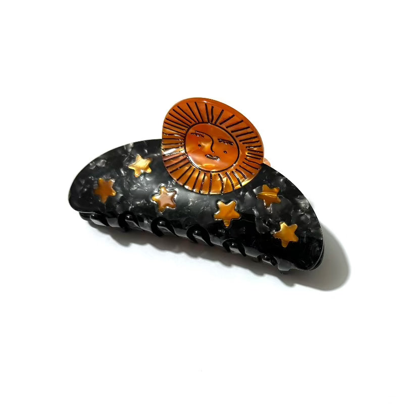 Alorar Sun Sunshine Hair Claw Clamp in vibrant yellow with a glossy finish, perfect for securing hair stylishly.