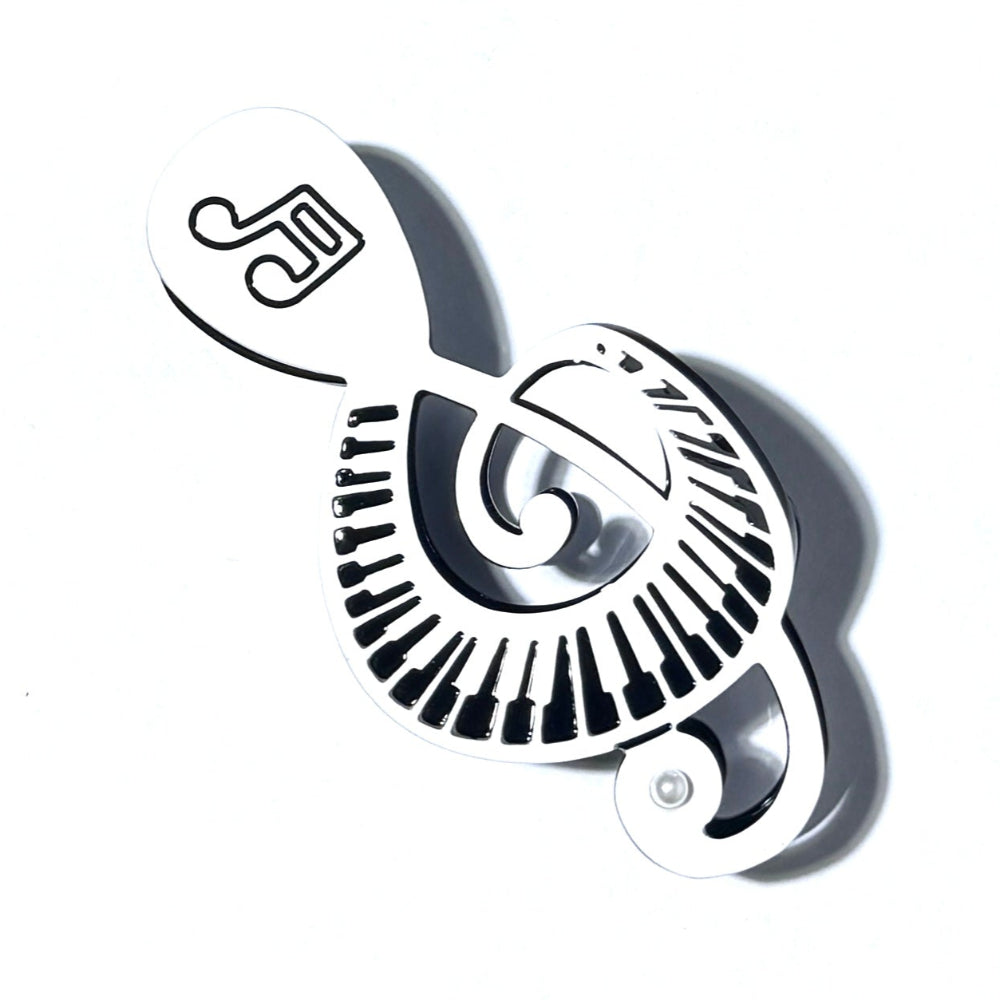 Alorar musical symbols hair claw clamp featuring intricate music note designs in a stylish, functional shape.