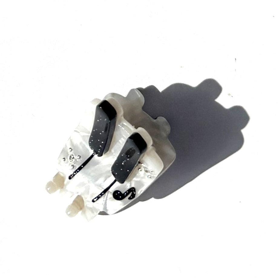 Alorar mini piano hair claw clamp featuring a sleek design with musical note accents in a stylish color.