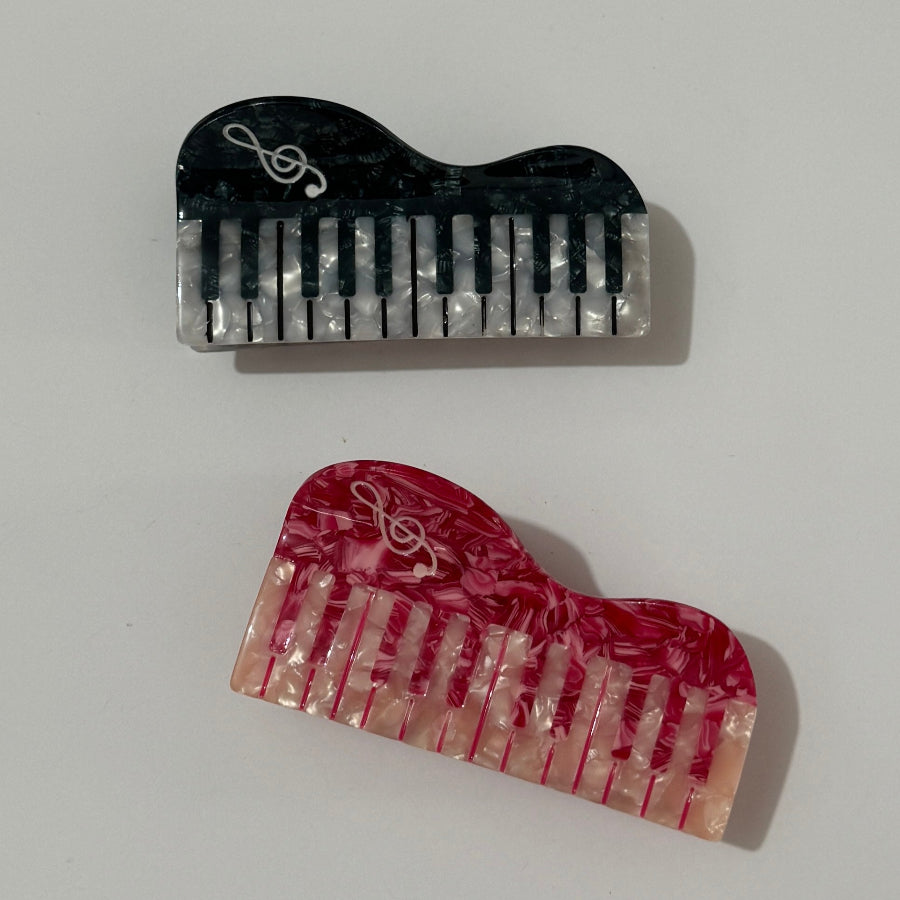 Alorar classic piano hair claw clamp featuring a sleek design and sturdy grip for stylish hair styling.